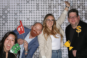 A Group Of People Posing For A Picture At NAB 2024