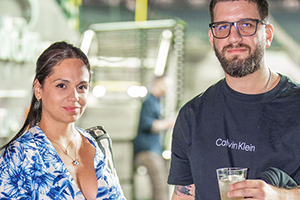 A Man And A Woman Standing Next To Each Other At NAB 2024