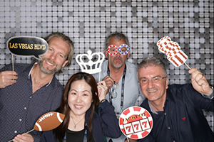 A Group Of People Posing For A Picture At NAB 2024