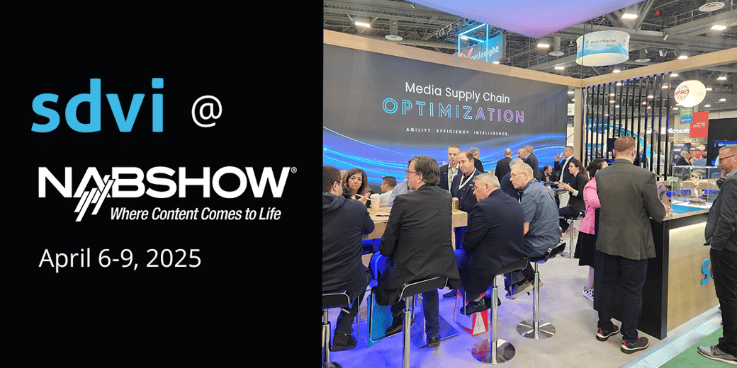 large group of people at the nabshow SDVI booth, showcasing Media Supply Chain Transformation