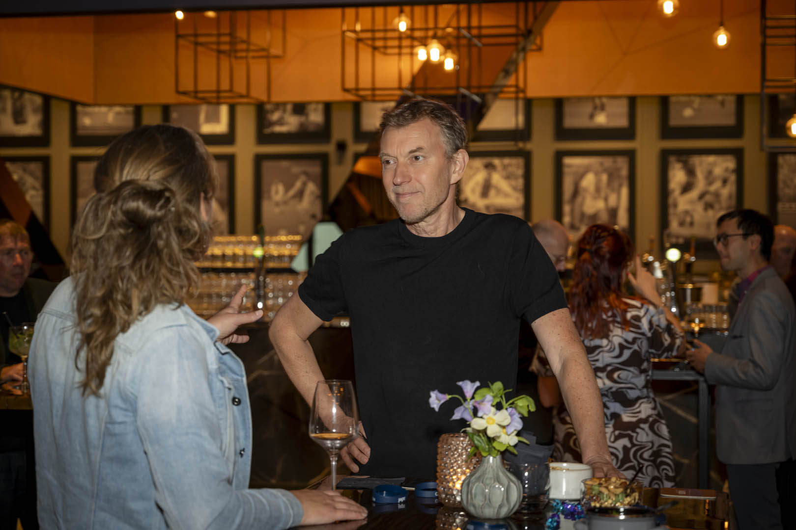 man in a suit and tie posing for a picture